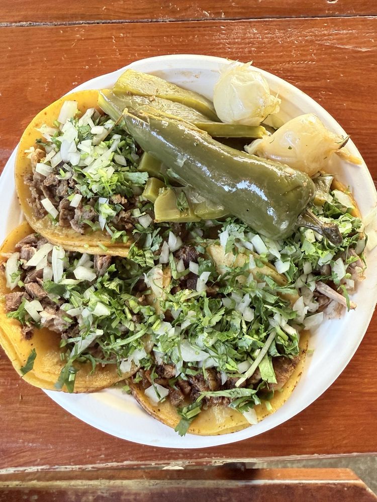 Carne asada, lengua, suadero and al pastor tacos
